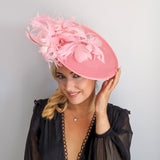 Pink large feather saucer disc fascinator hat Pink large feather saucer disc fascinator hat