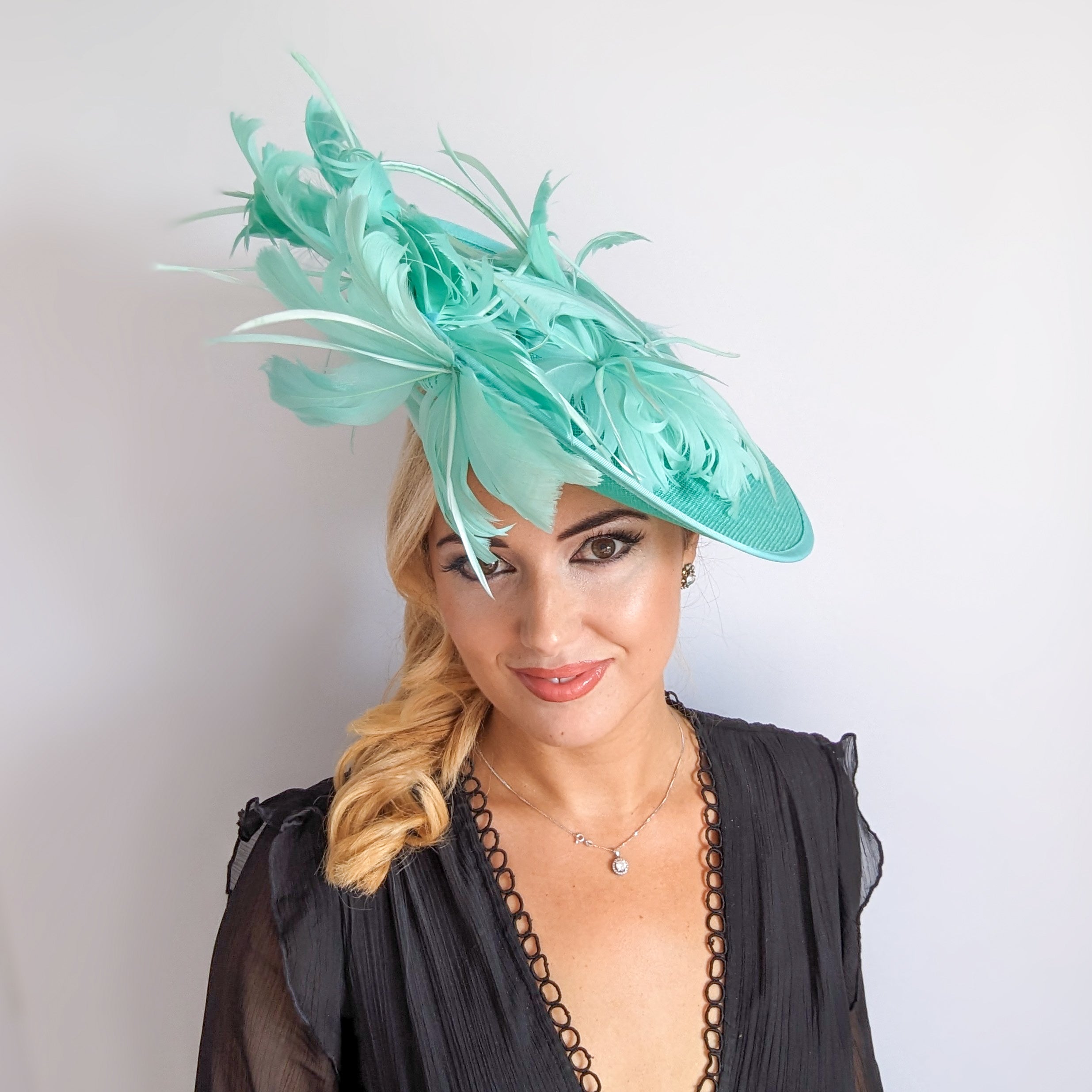 Seafoam mint green feather large saucer disc fascinator hat Seafoam mint green feather large saucer disc fascinator hat