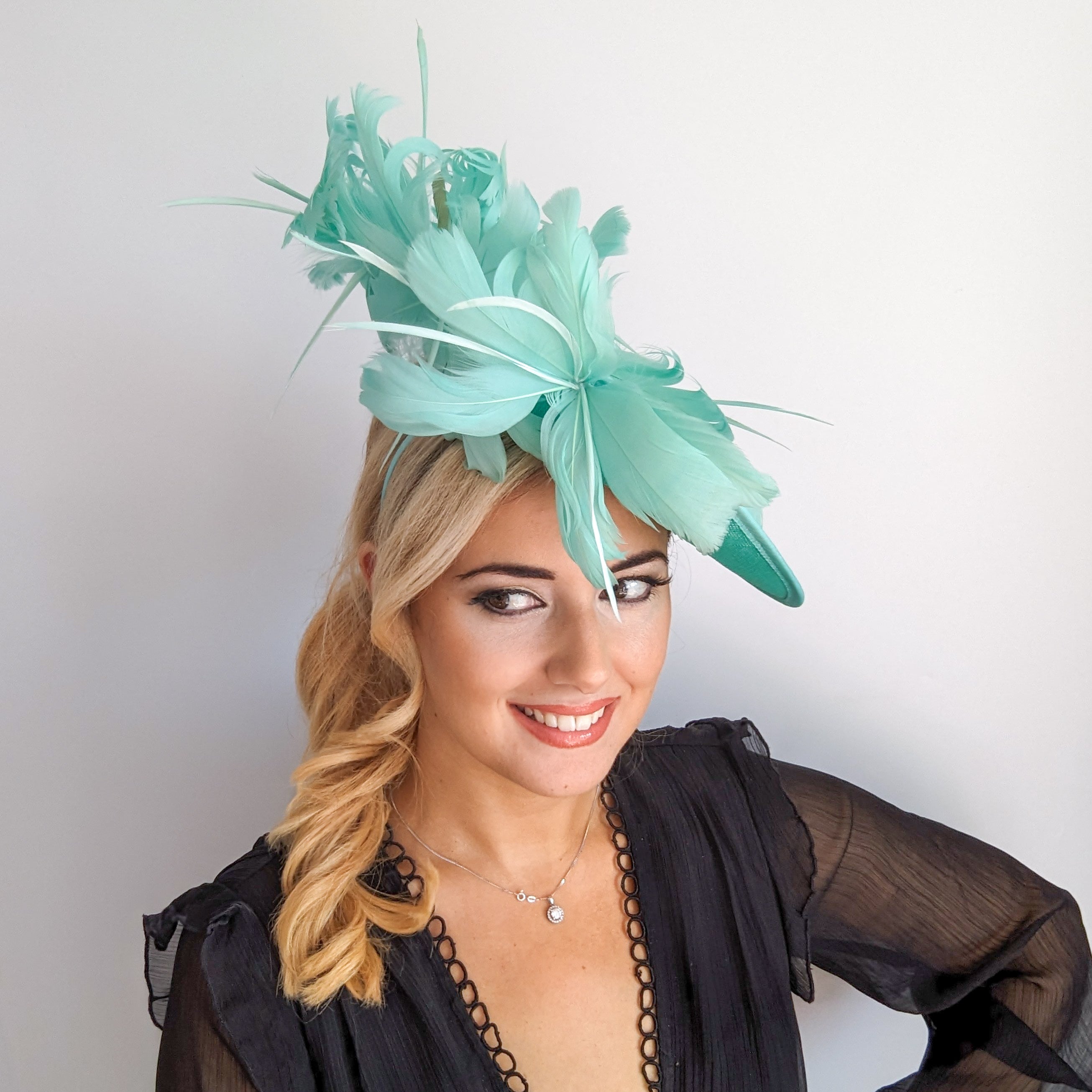 Seafoam mint green feather large saucer disc fascinator hat Seafoam mint green feather large saucer disc fascinator hat