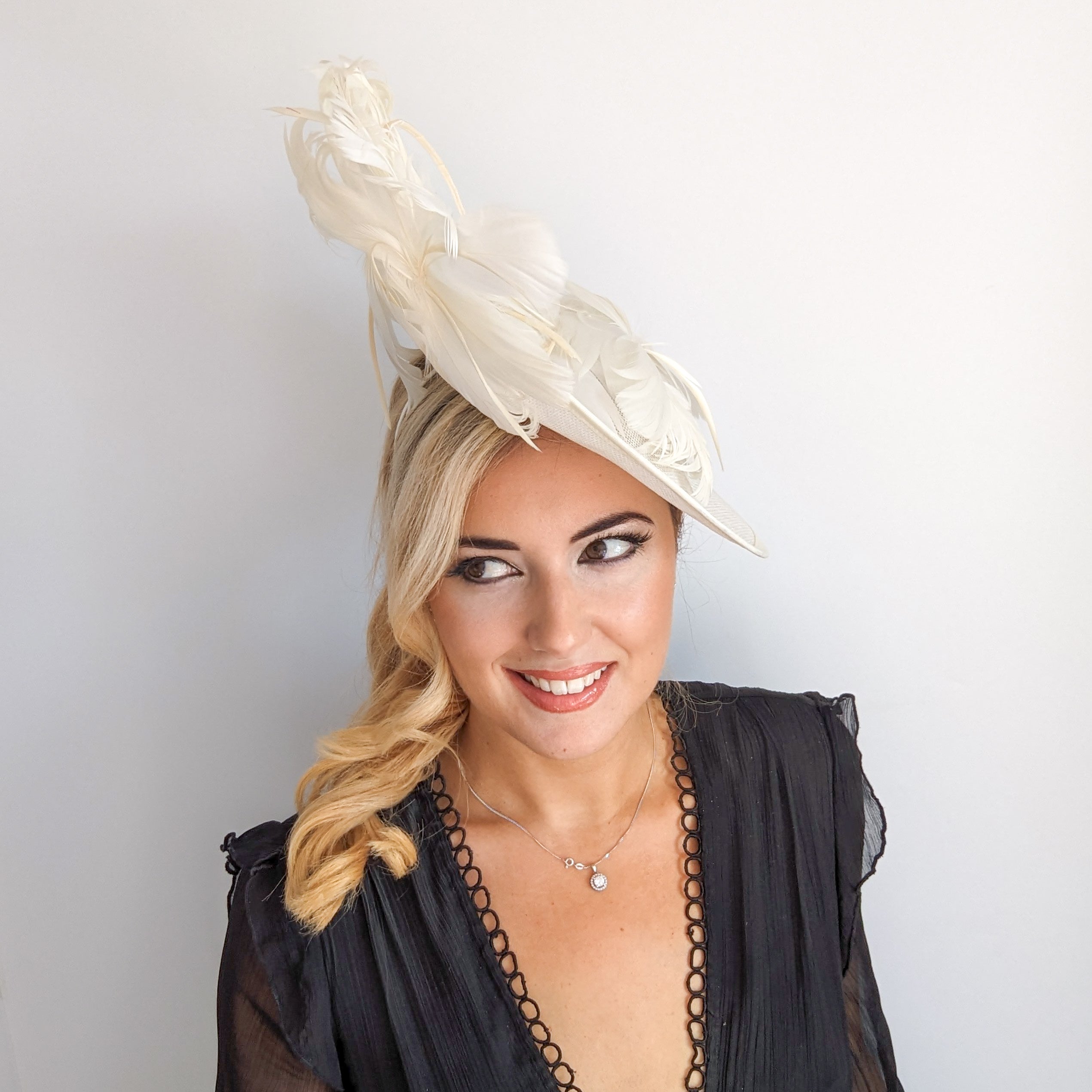 Cream feather large saucer disc fascinator hat Cream feather large saucer disc fascinator hat