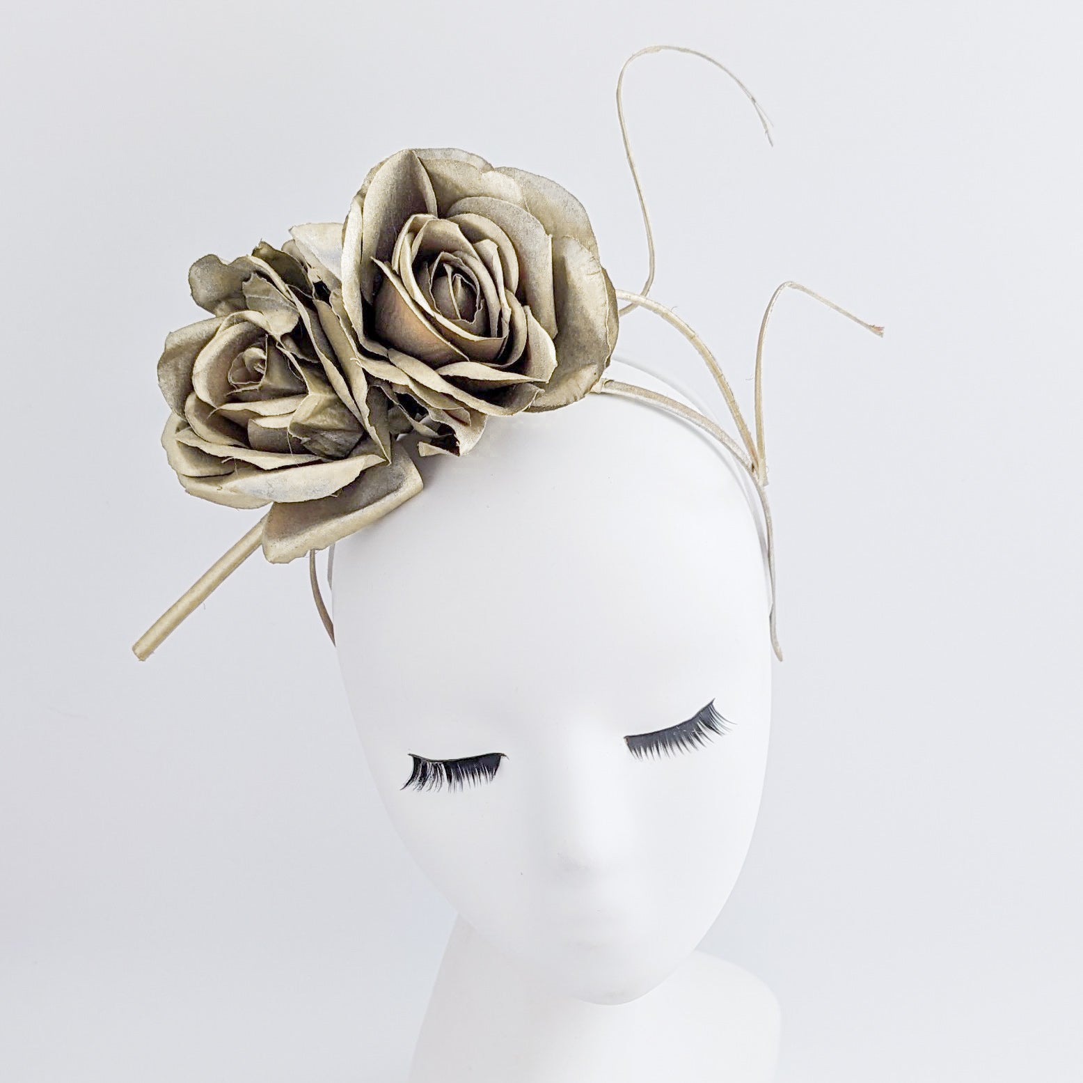 Gold shimmer rose flower fascinator hat