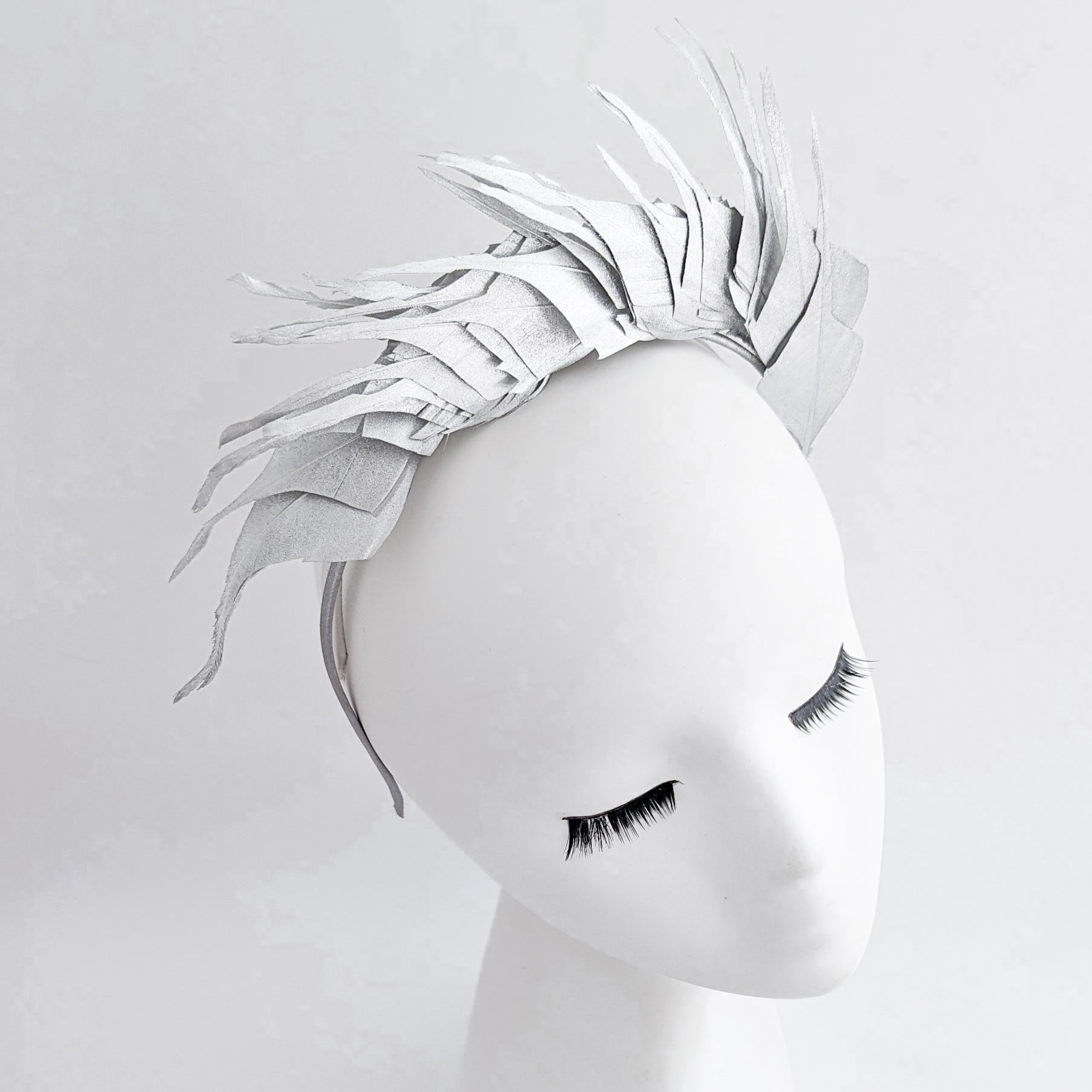 Silver metallic shimmer feather headband fascinator
