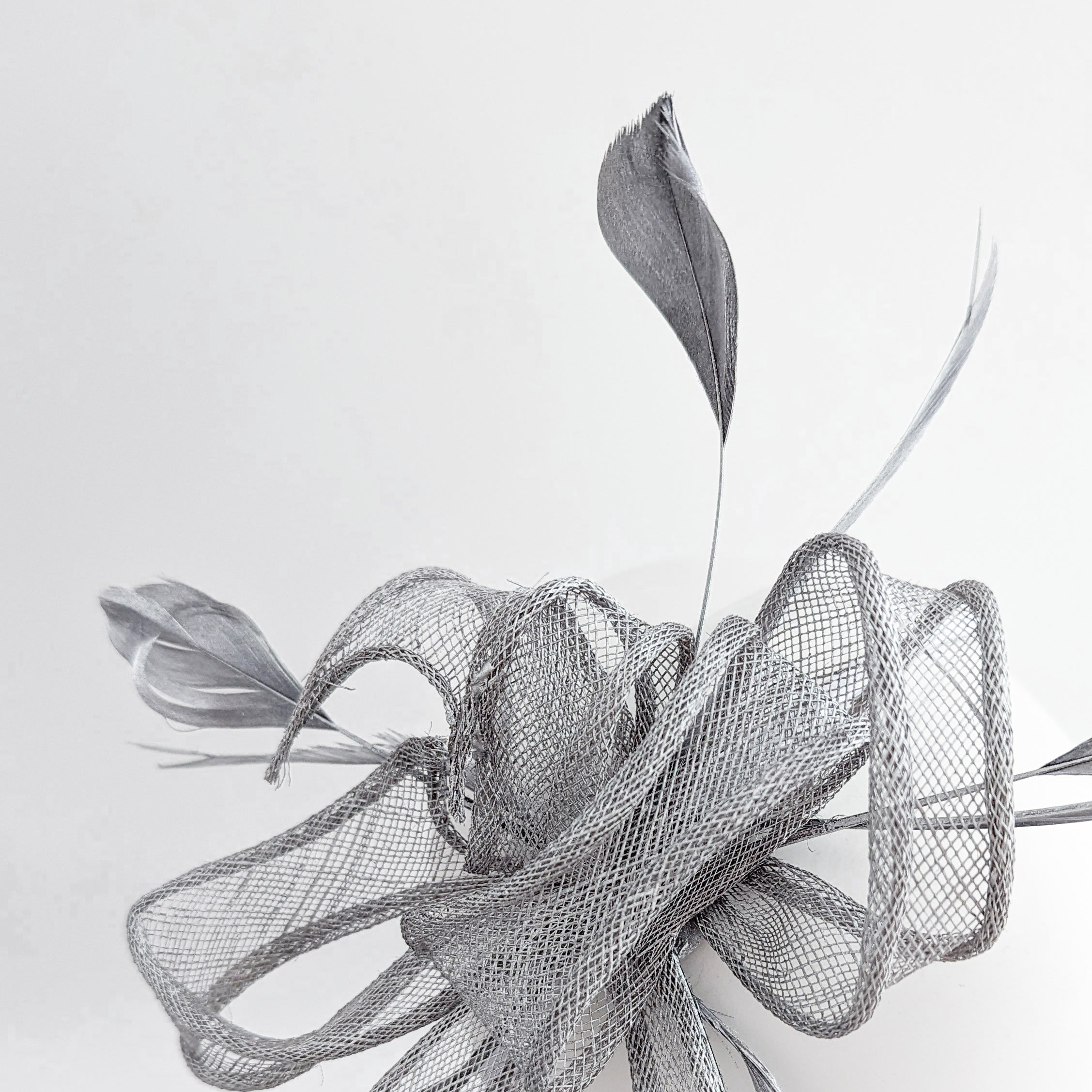 Silver shimmer feather fascinator hat