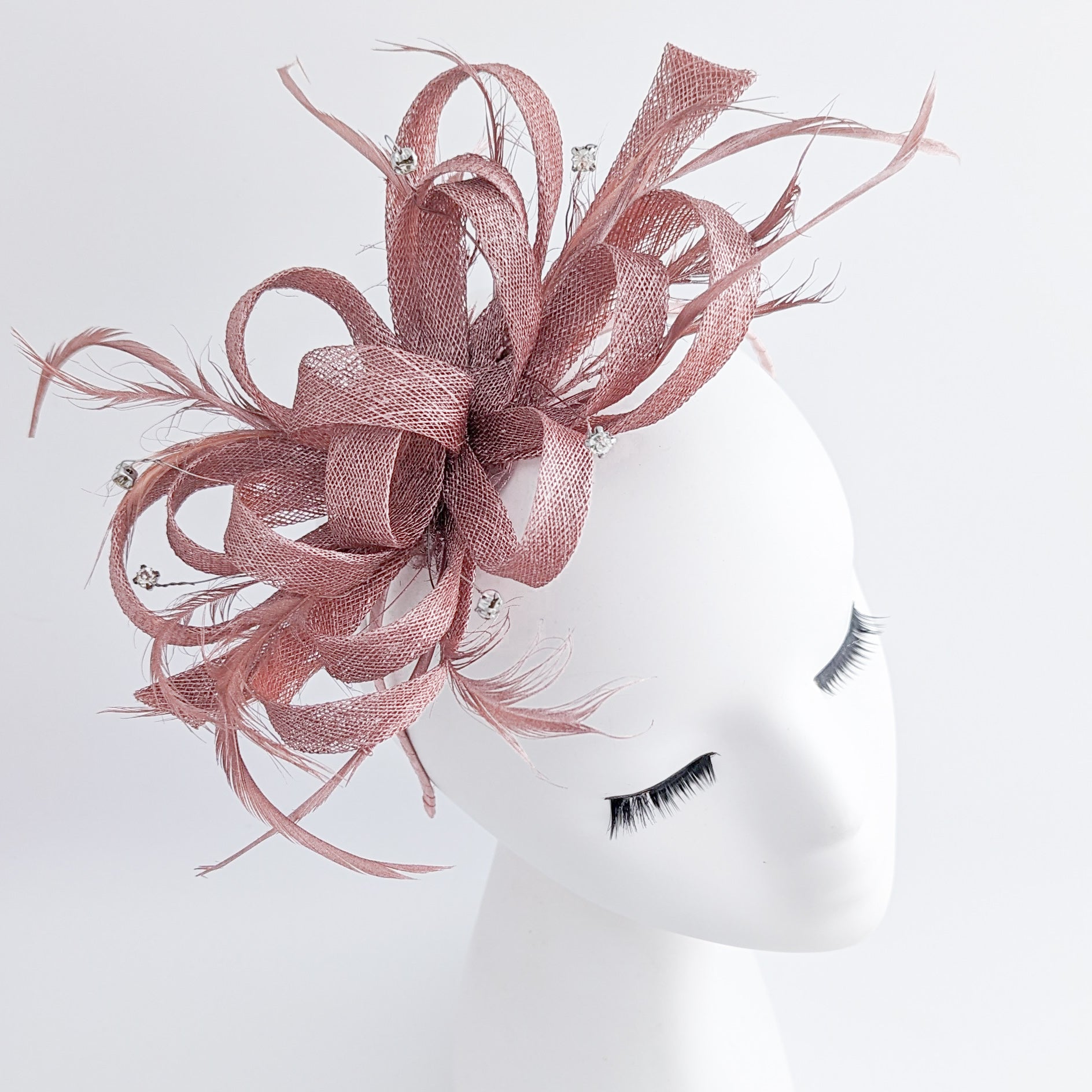 Rose gold shimmer crystal feather fascinator hat