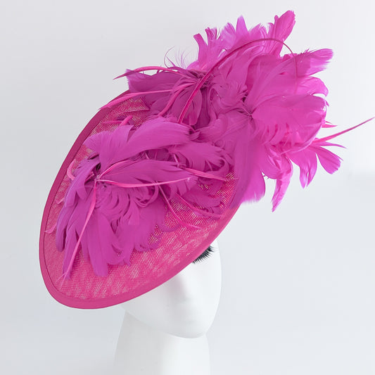Fuchsia pink large feather saucer disc fascinator hat