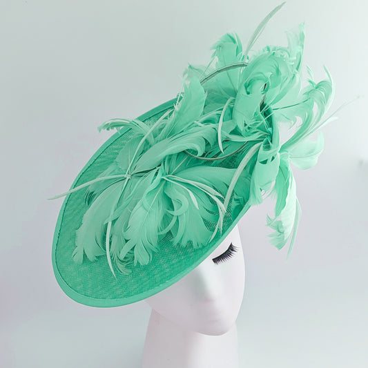 Seafoam mint green feather large saucer disc fascinator hat