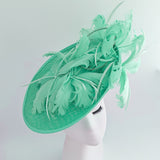 Seafoam mint green feather large saucer disc fascinator hat Seafoam mint green feather large saucer disc fascinator hat