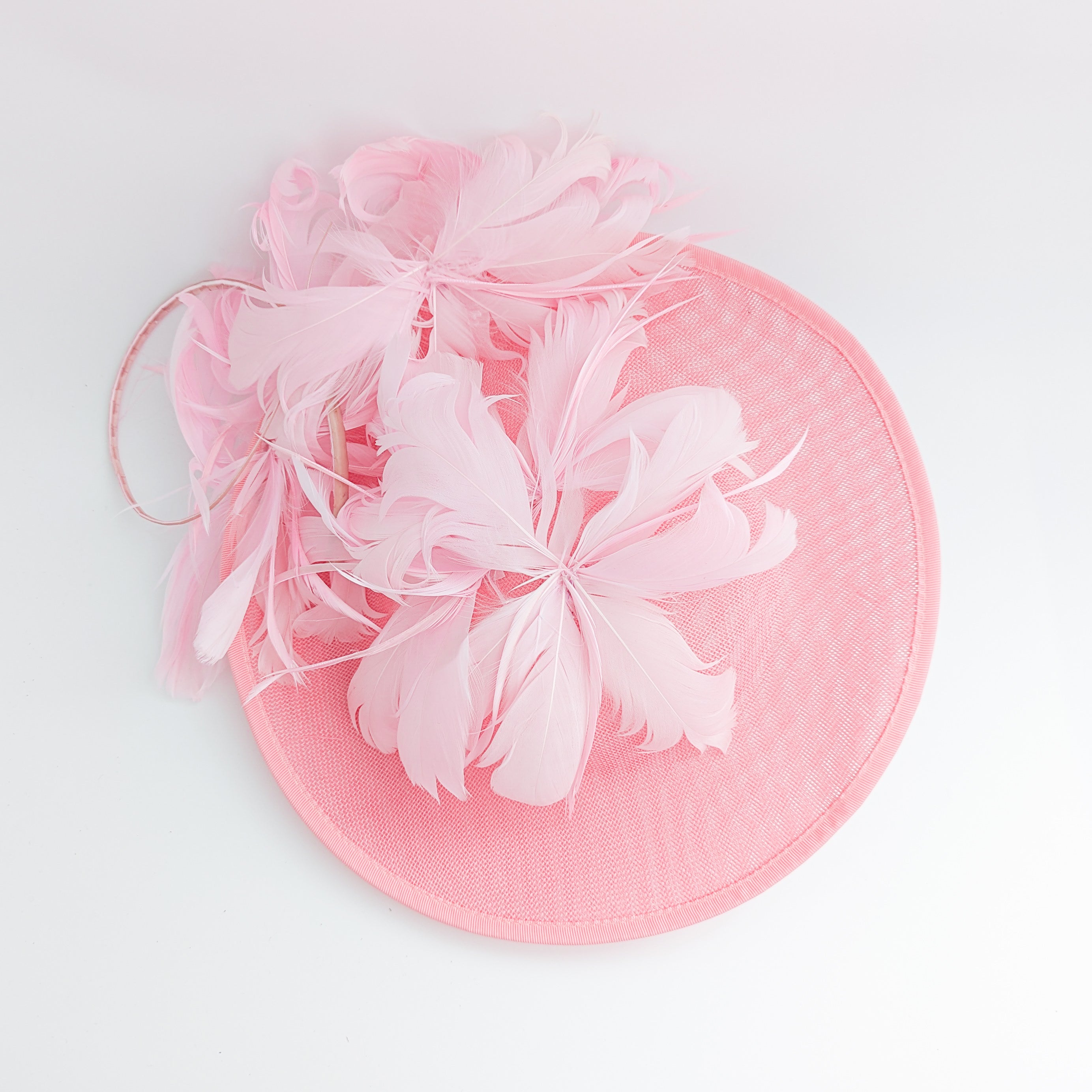 Pink large feather saucer disc fascinator hat Pink large feather saucer disc fascinator hat