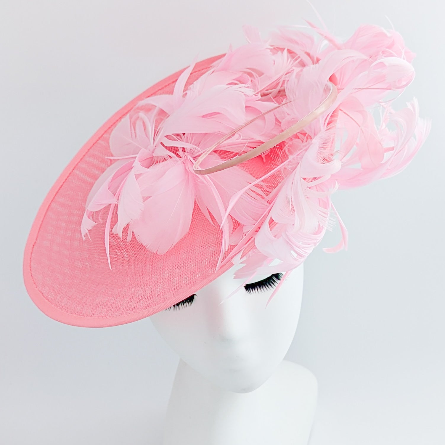 Pink large feather saucer disc fascinator hat Pink large feather saucer disc fascinator hat