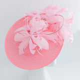 Pink large feather saucer disc fascinator hat Pink large feather saucer disc fascinator hat