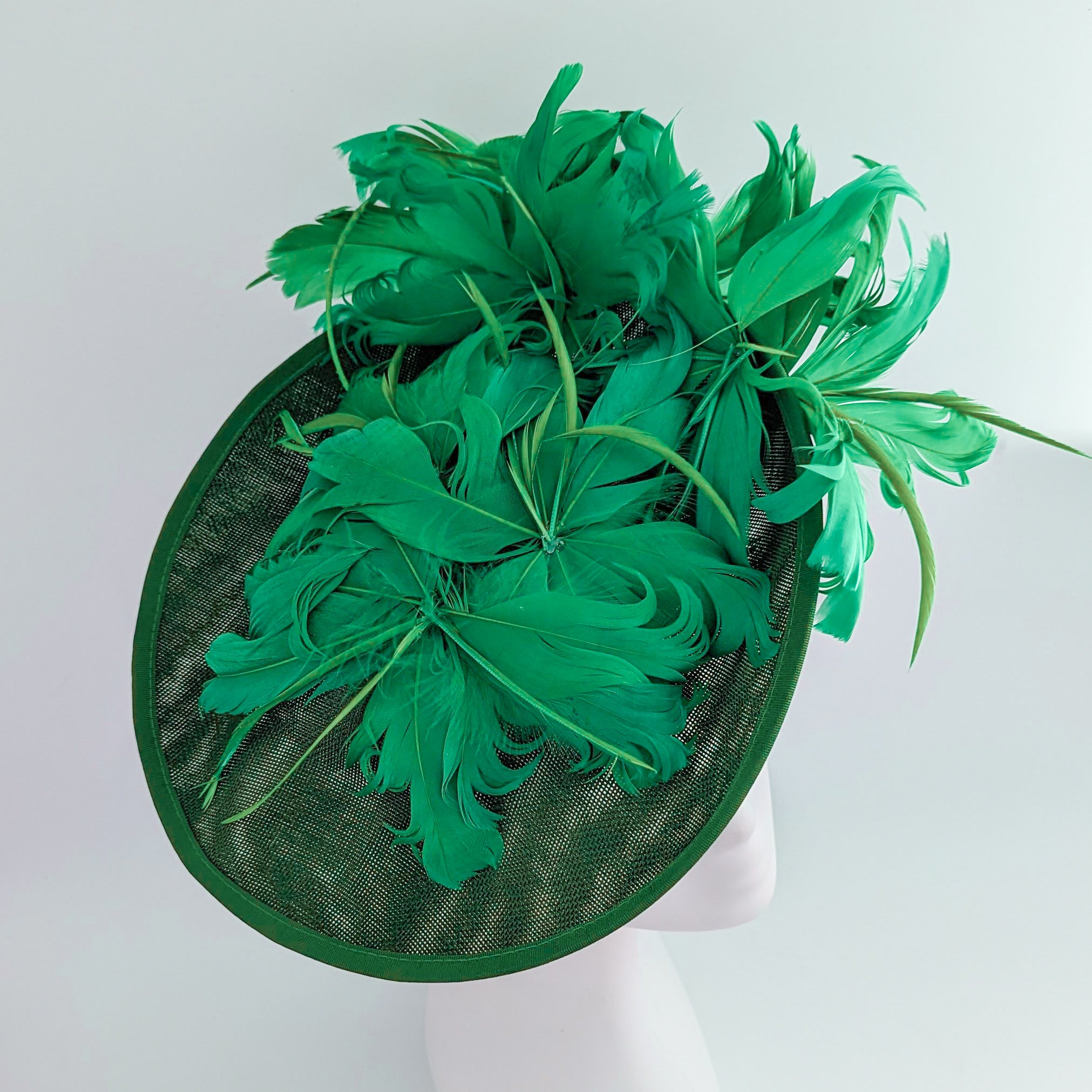 Emerald green feather large saucer disc fascinator hat Emerald green feather large saucer disc fascinator hat