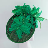 Emerald green feather large saucer disc fascinator hat Emerald green feather large saucer disc fascinator hat
