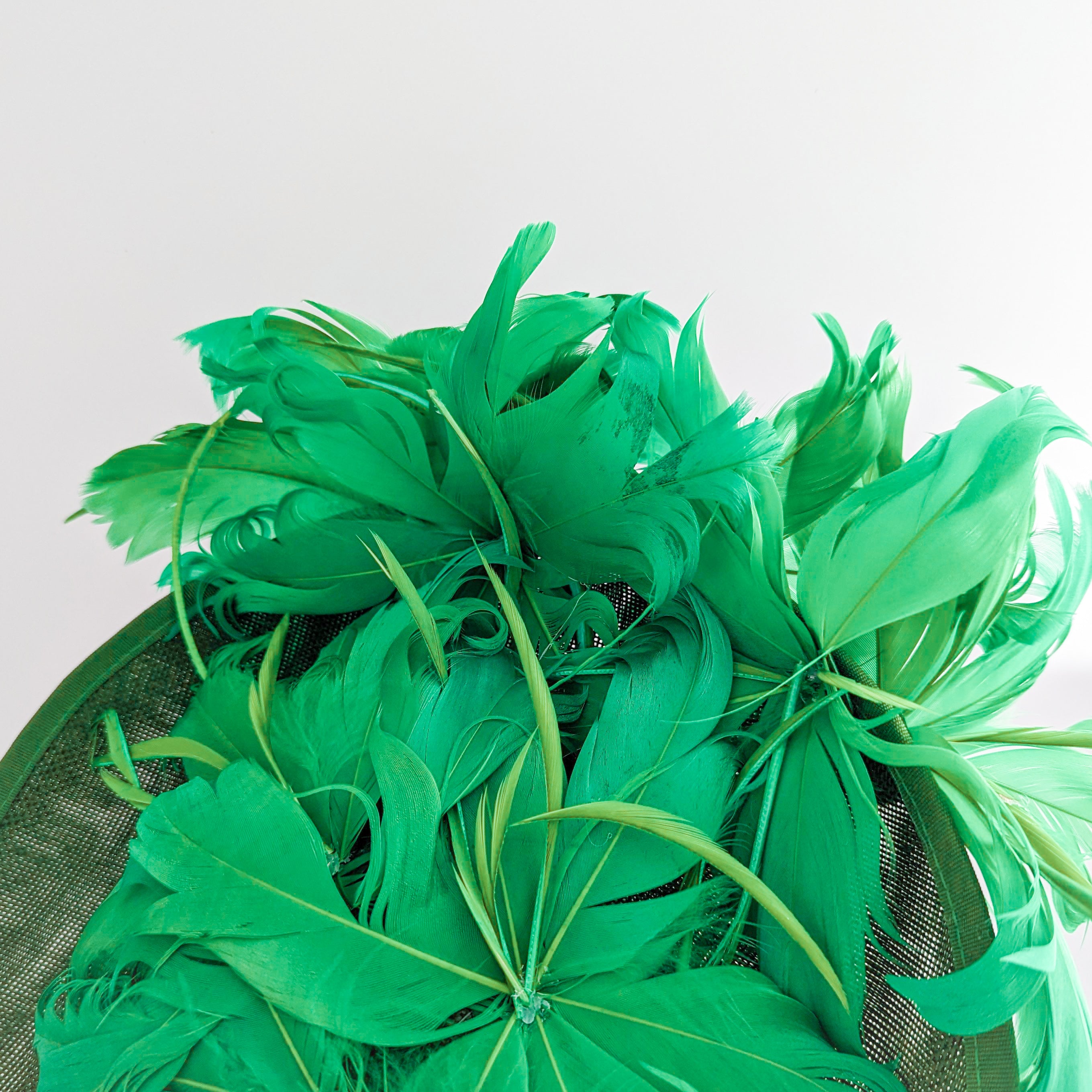 Emerald green feather large saucer disc fascinator hat Emerald green feather large saucer disc fascinator hat
