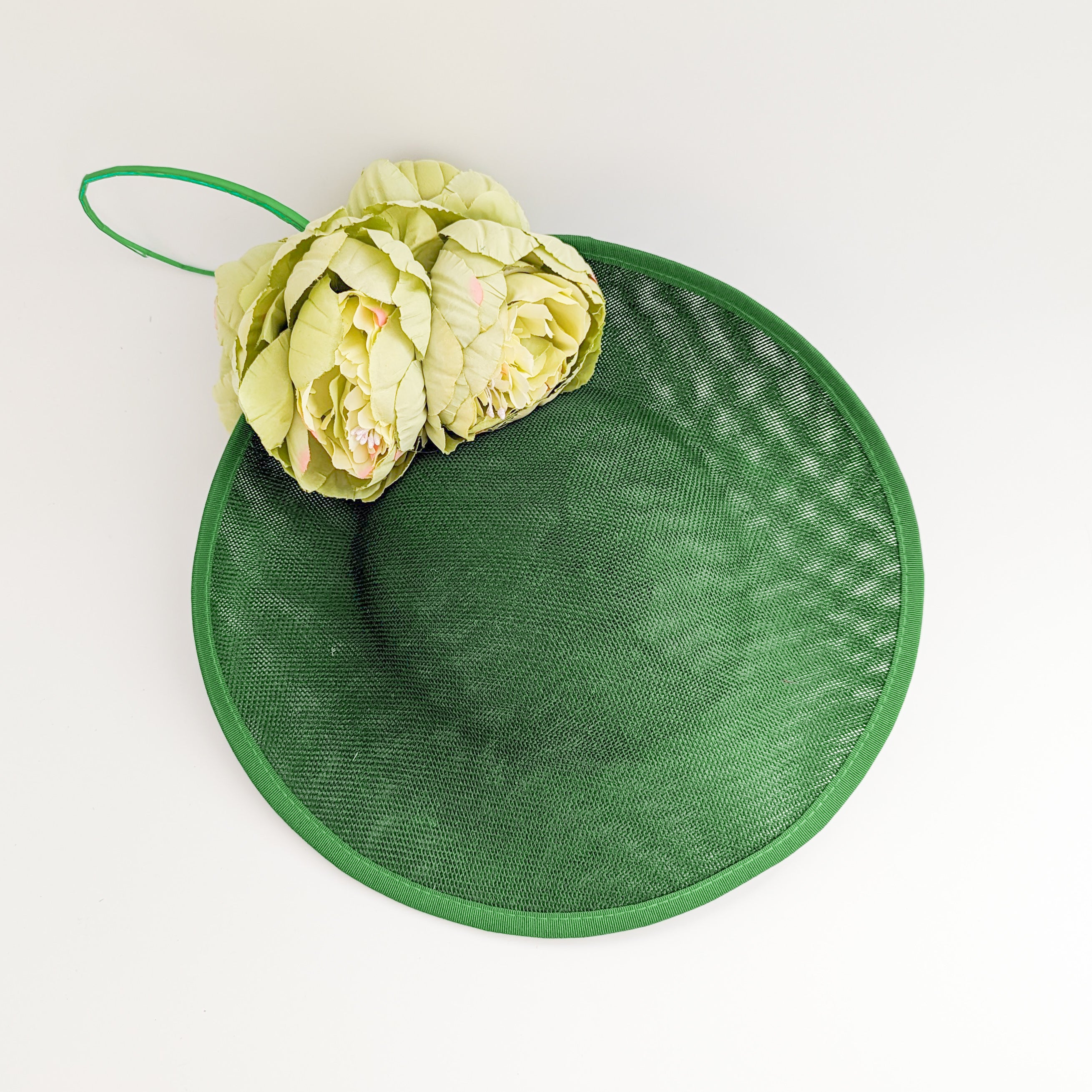 Emerald green large flower saucer disc fascinator hat Emerald green large flower saucer disc fascinator hat