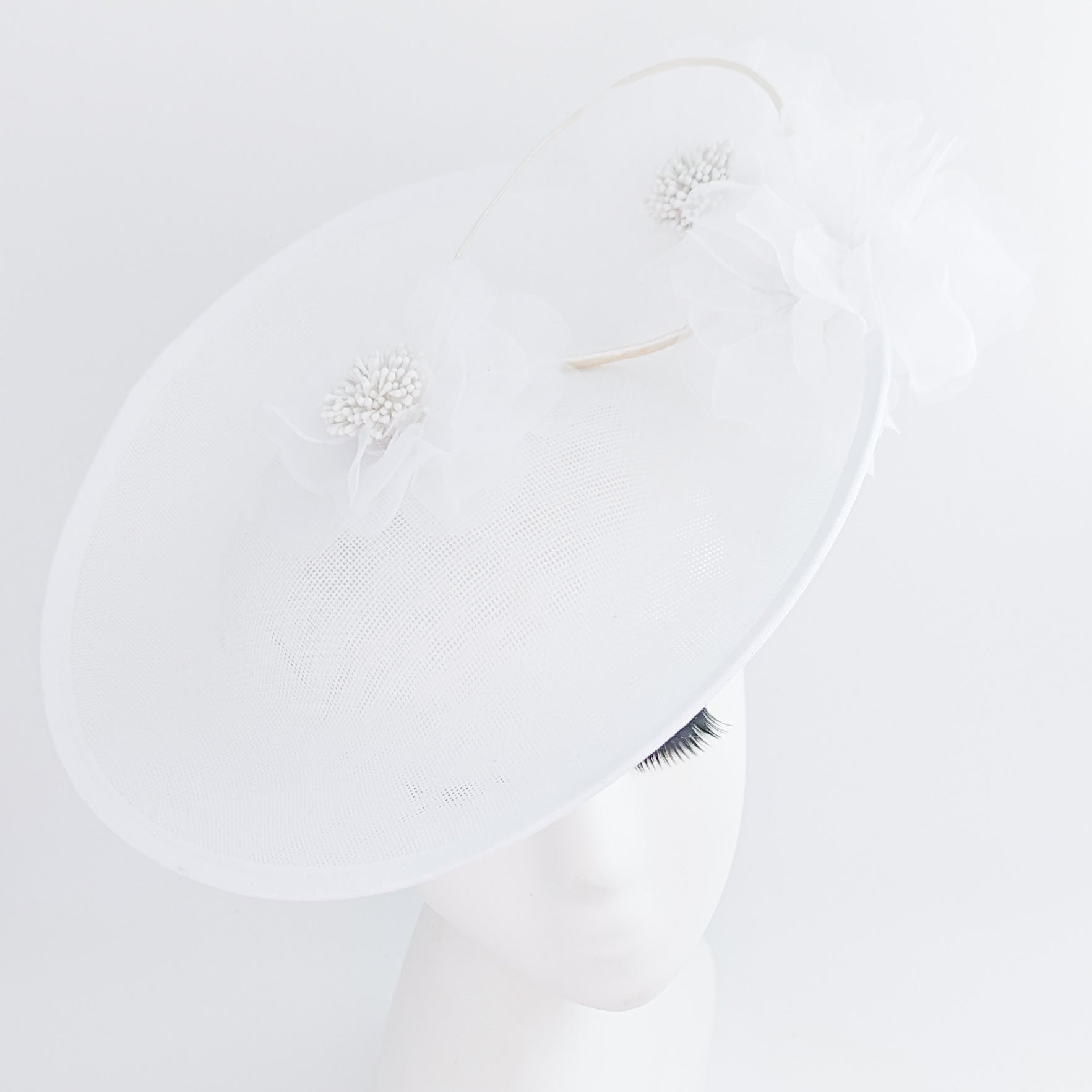 White large flower saucer disc fascinator hat White large flower saucer disc fascinator hat