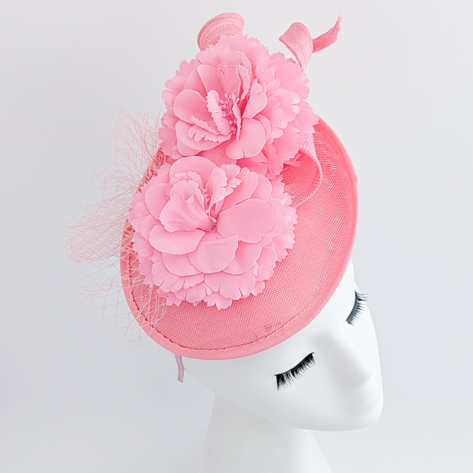 Pink flower fascinator disc saucer hat