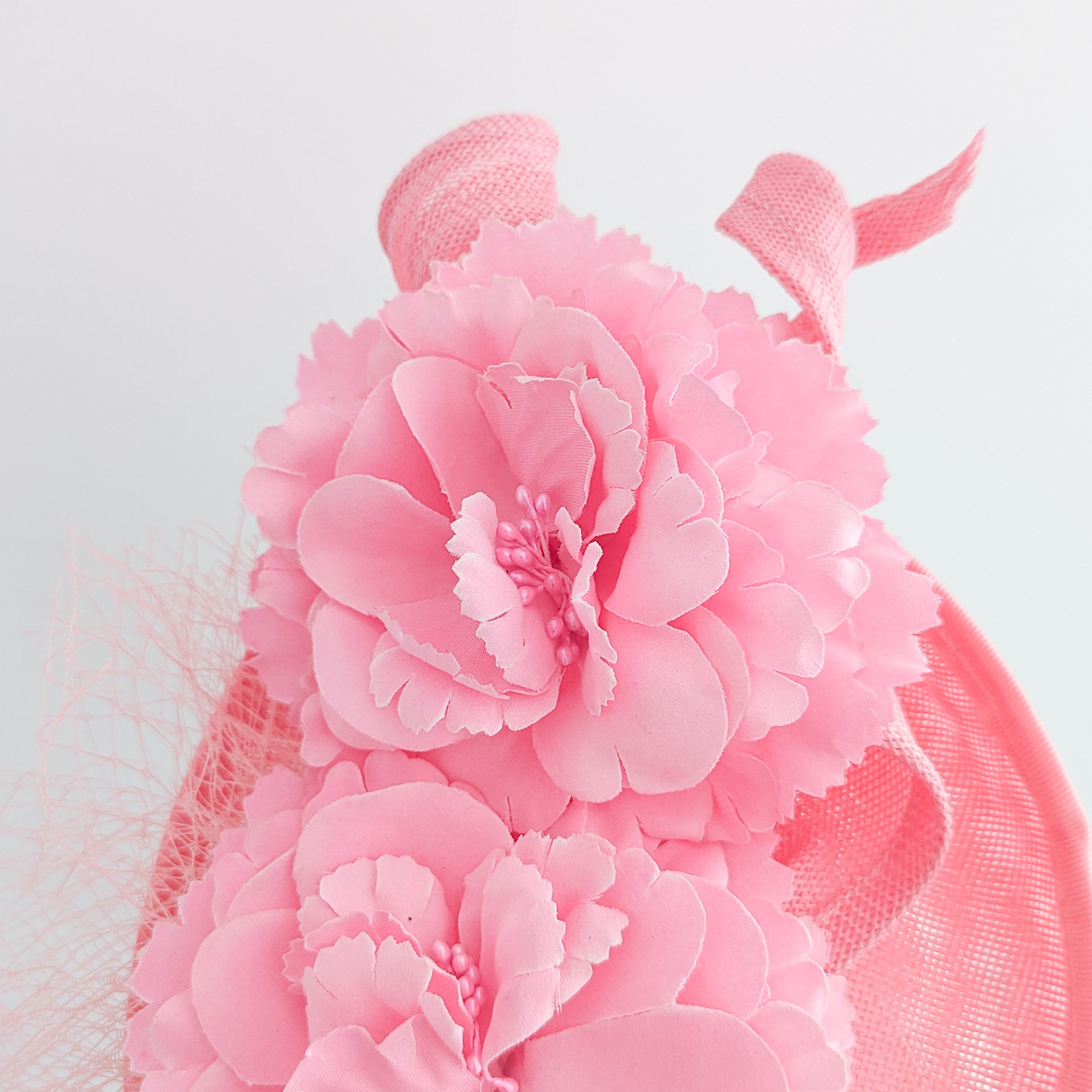 Pink flower fascinator disc saucer hat