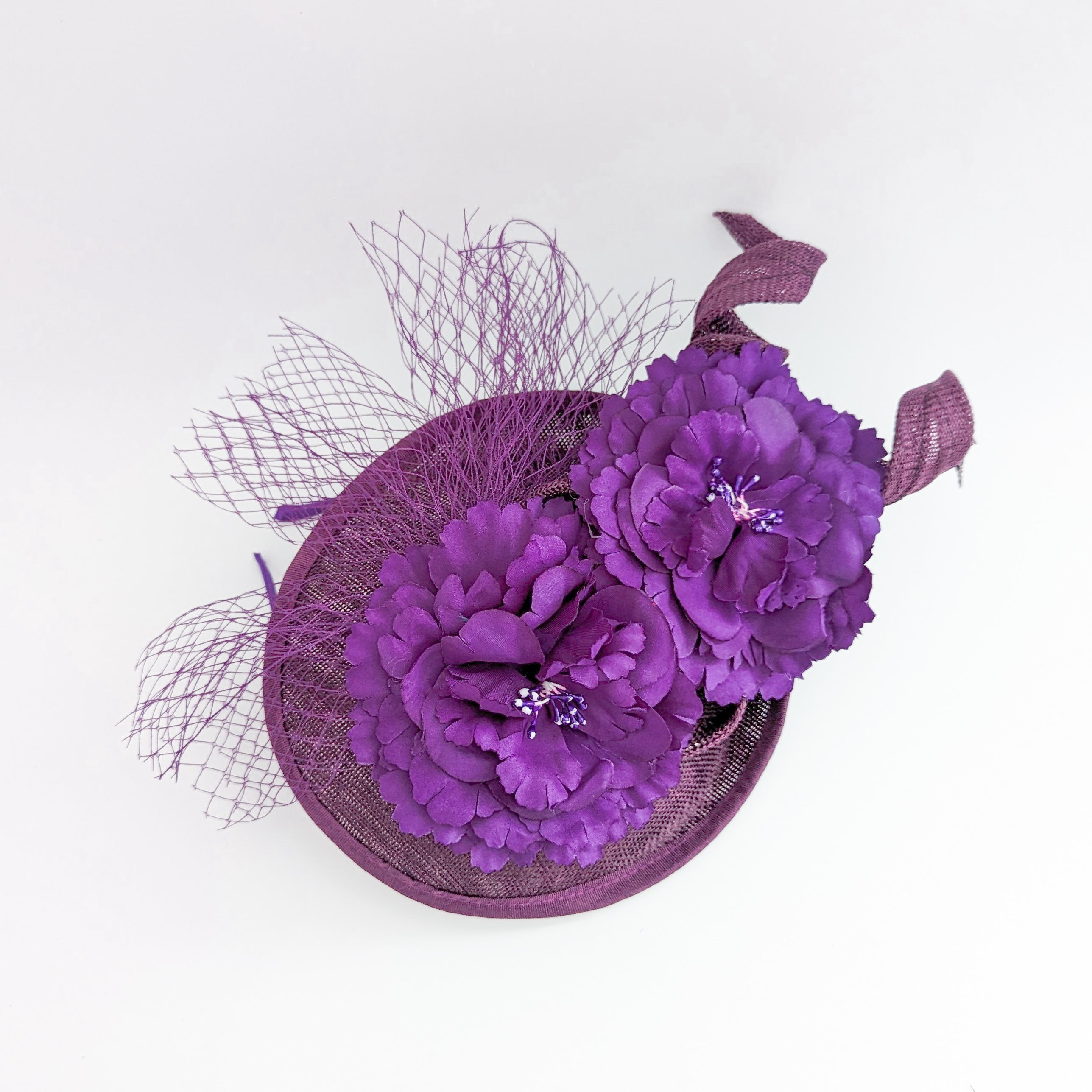 Dark plum purple flower fascinator disc saucer hat Dark plum purple flower fascinator disc saucer hat