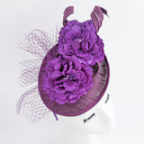 Dark plum purple flower fascinator disc saucer hat Dark plum purple flower fascinator disc saucer hat