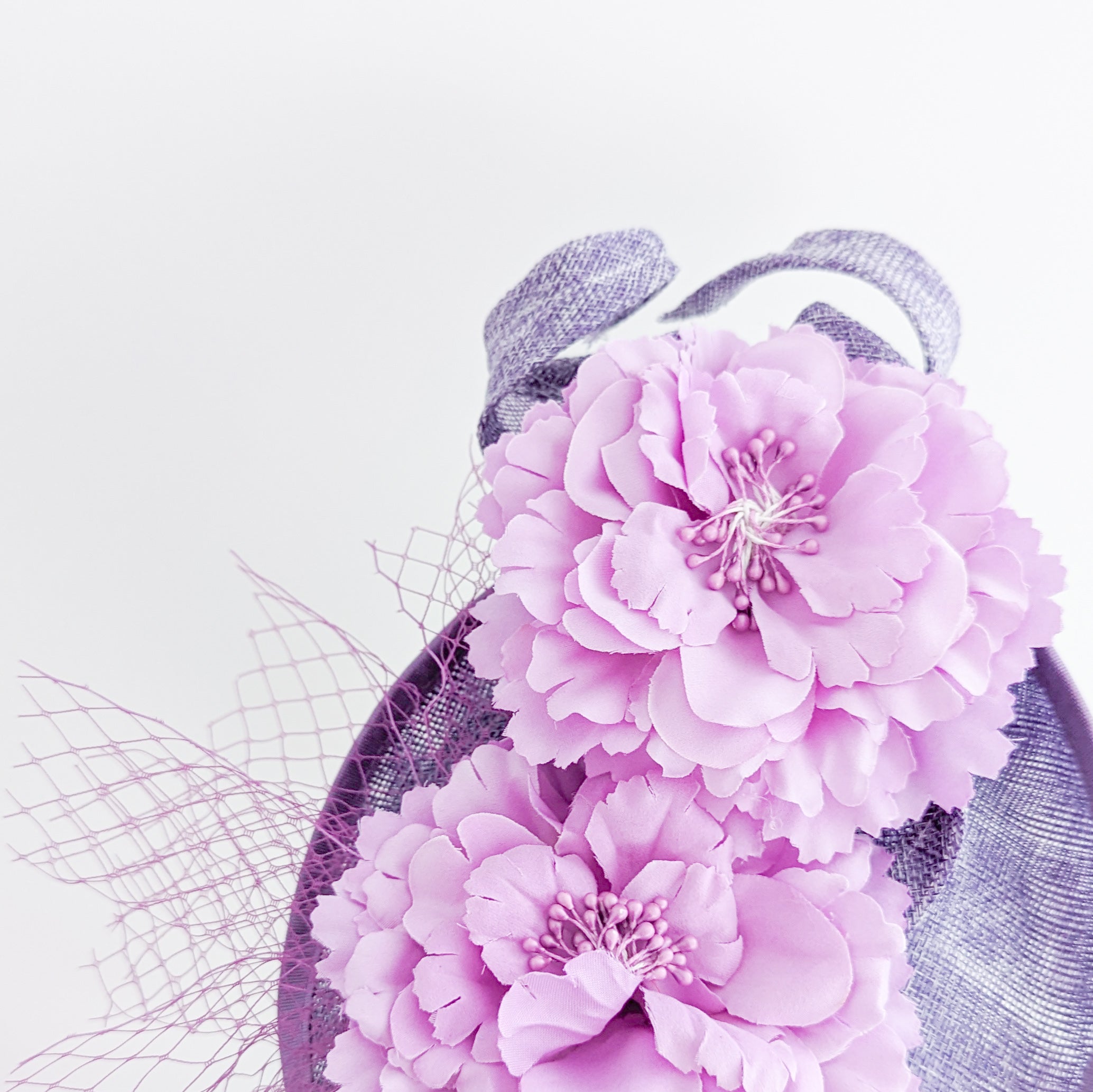 Lavender lilac purple flower fascinator disc saucer hat Lavender lilac purple flower fascinator disc saucer hat