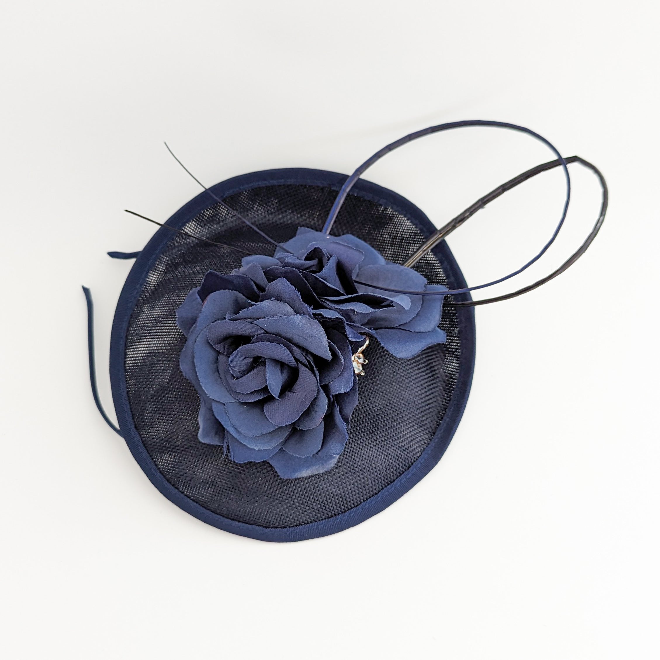 Navy blue flower disc saucer fascinator hat
