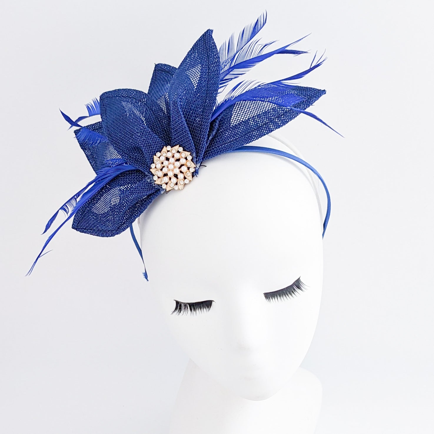 Royal cobalt blue feather petal fan fascinator hat Royal cobalt blue feather petal fan fascinator hat