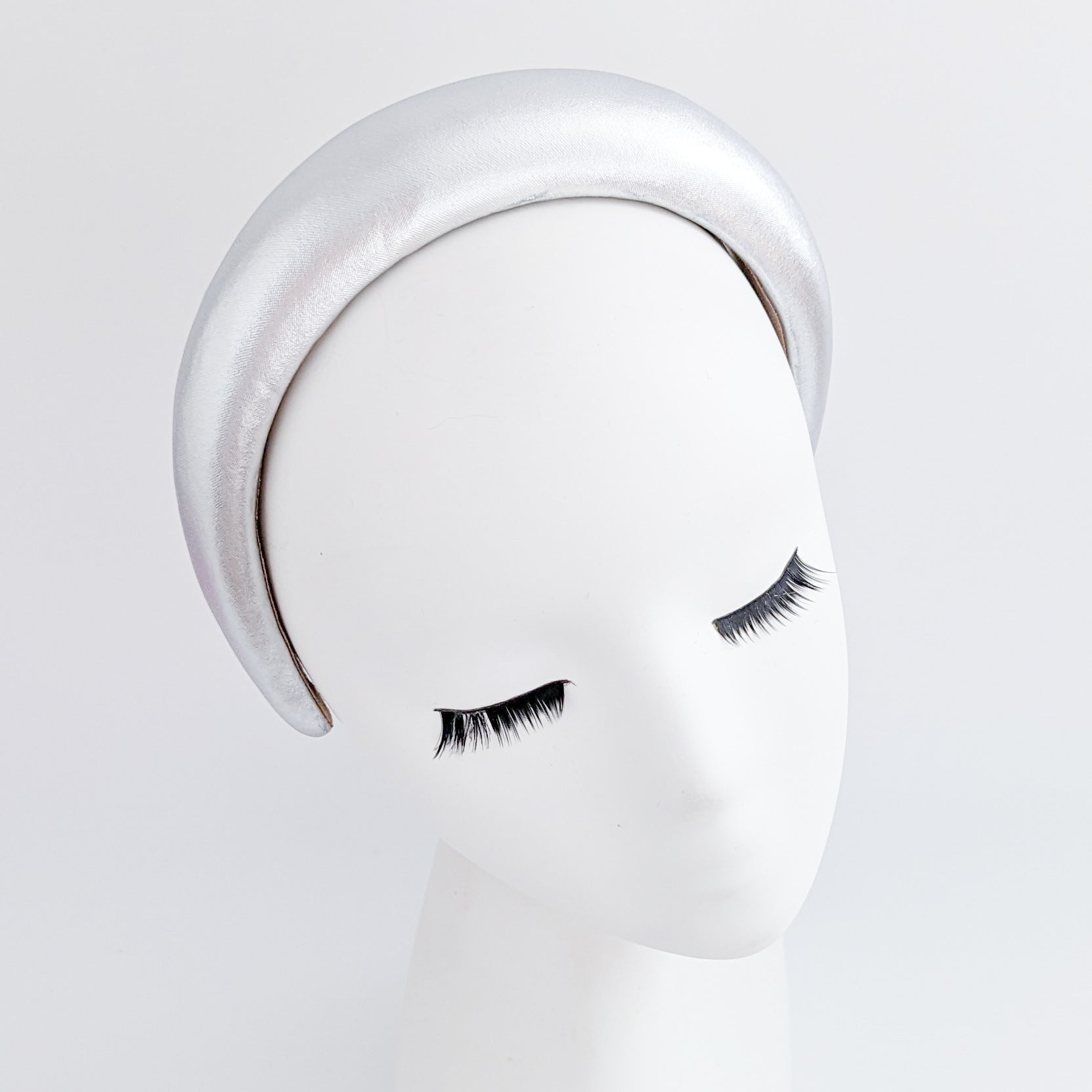 Silver metallic padded headband fascinator Silver metallic padded headband fascinator