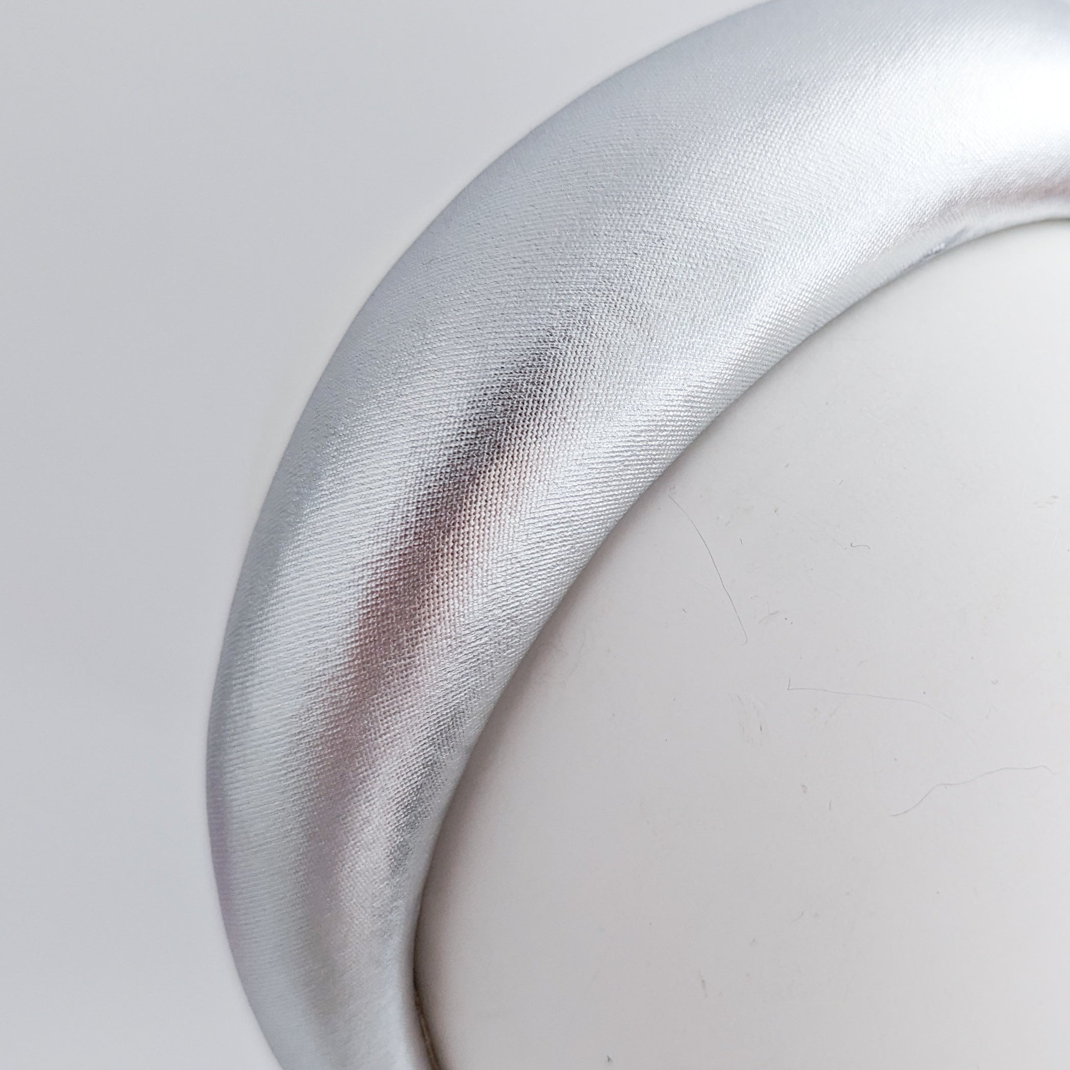 Silver metallic padded headband fascinator Silver metallic padded headband fascinator