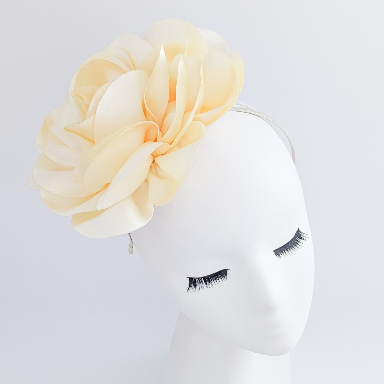 Large cream satin rose fascinator hat Large cream satin rose fascinator hat