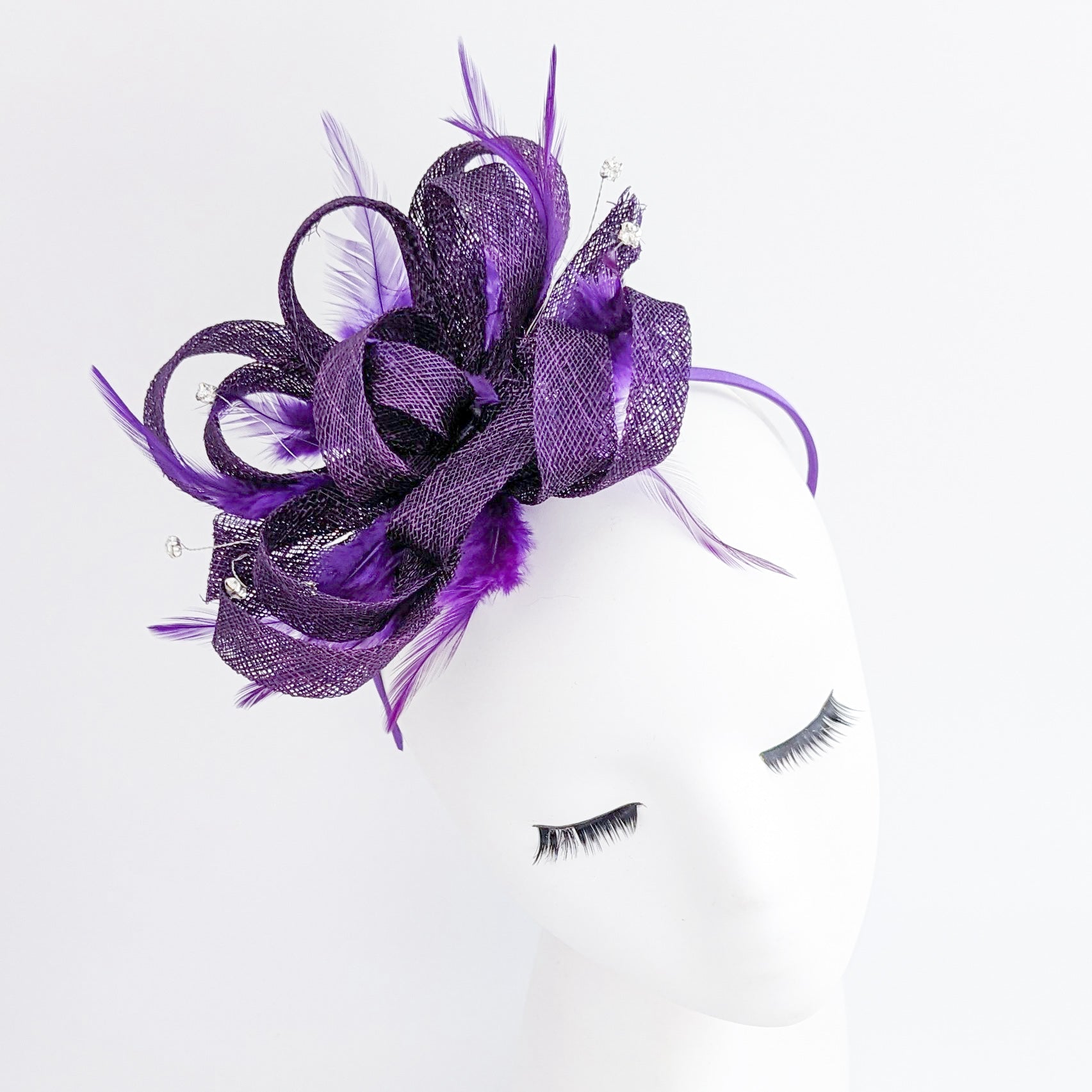 Aubergine cadbury purple crystal feather fascinator hat