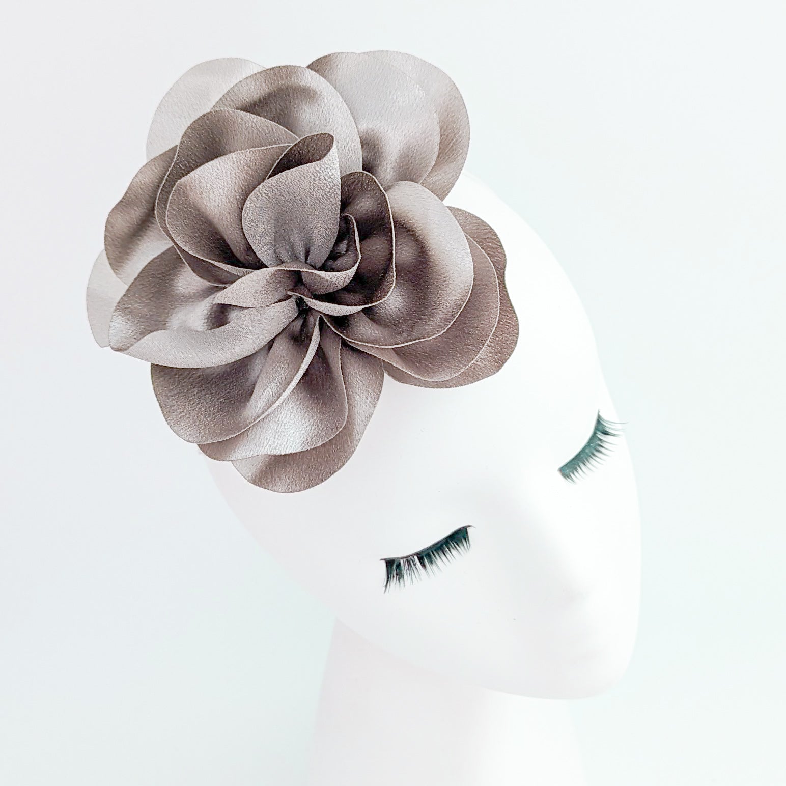Silver satin rose fascinator hat