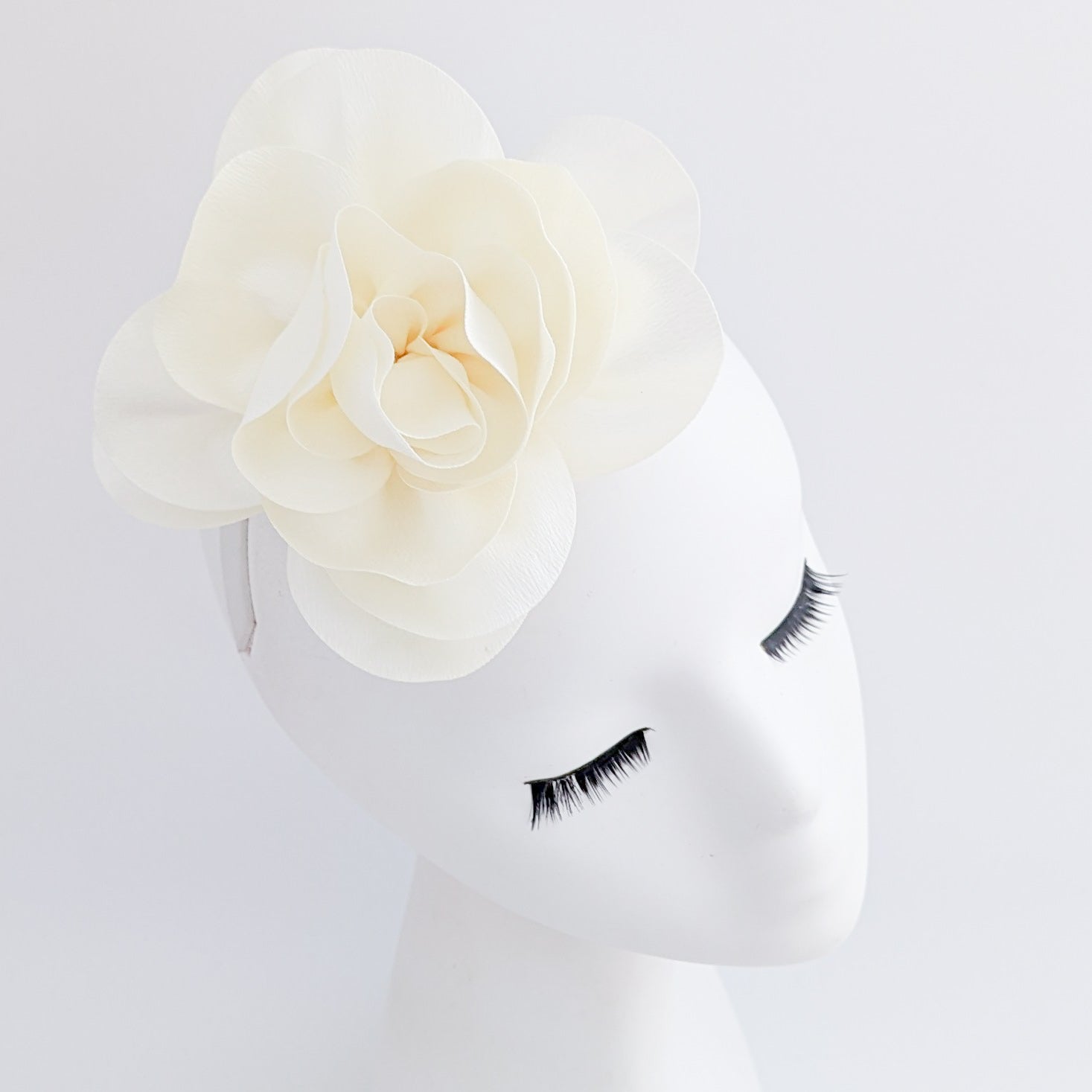 Cream satin rose fascinator hat