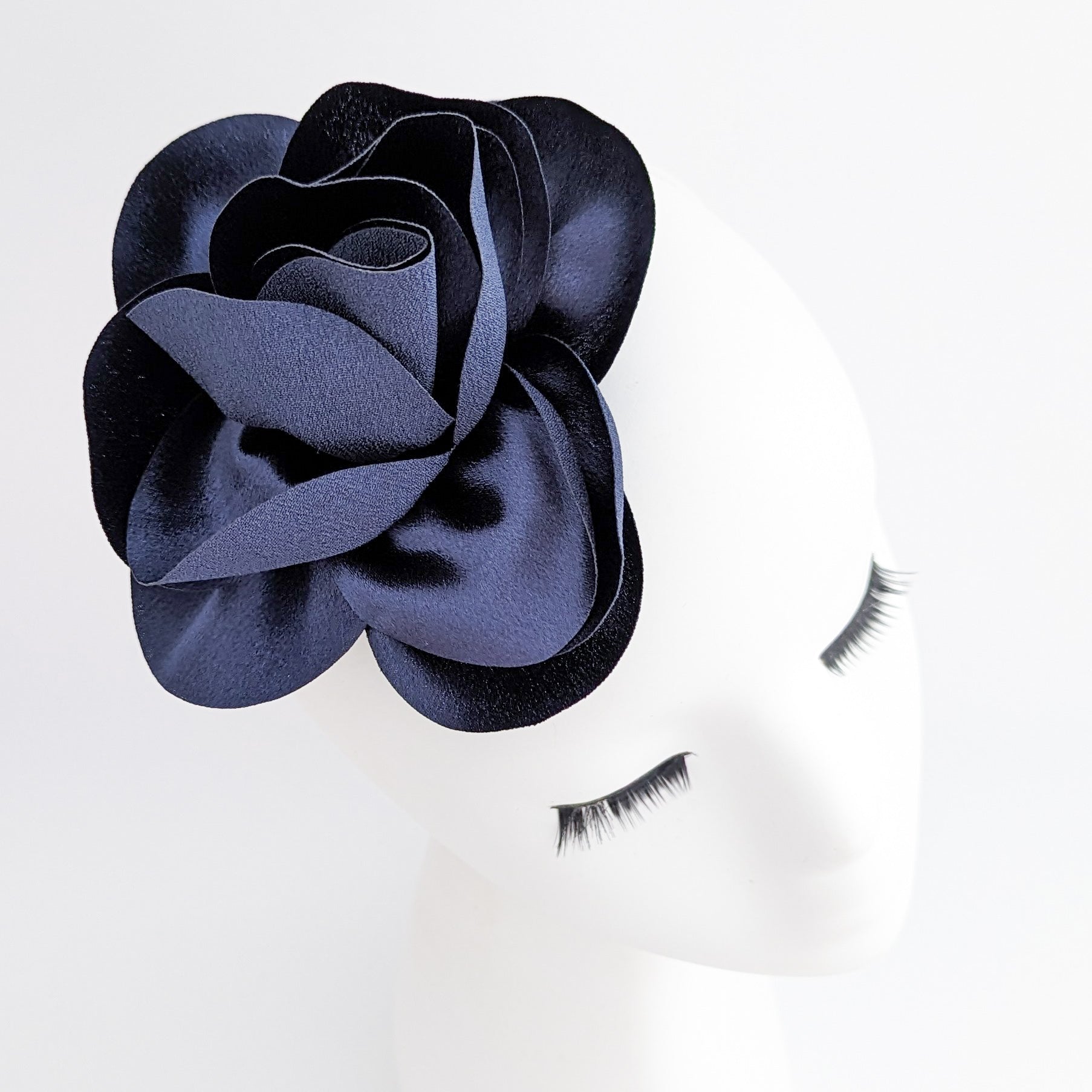 Navy blue satin rose fascinator hat Navy blue satin rose fascinator hat