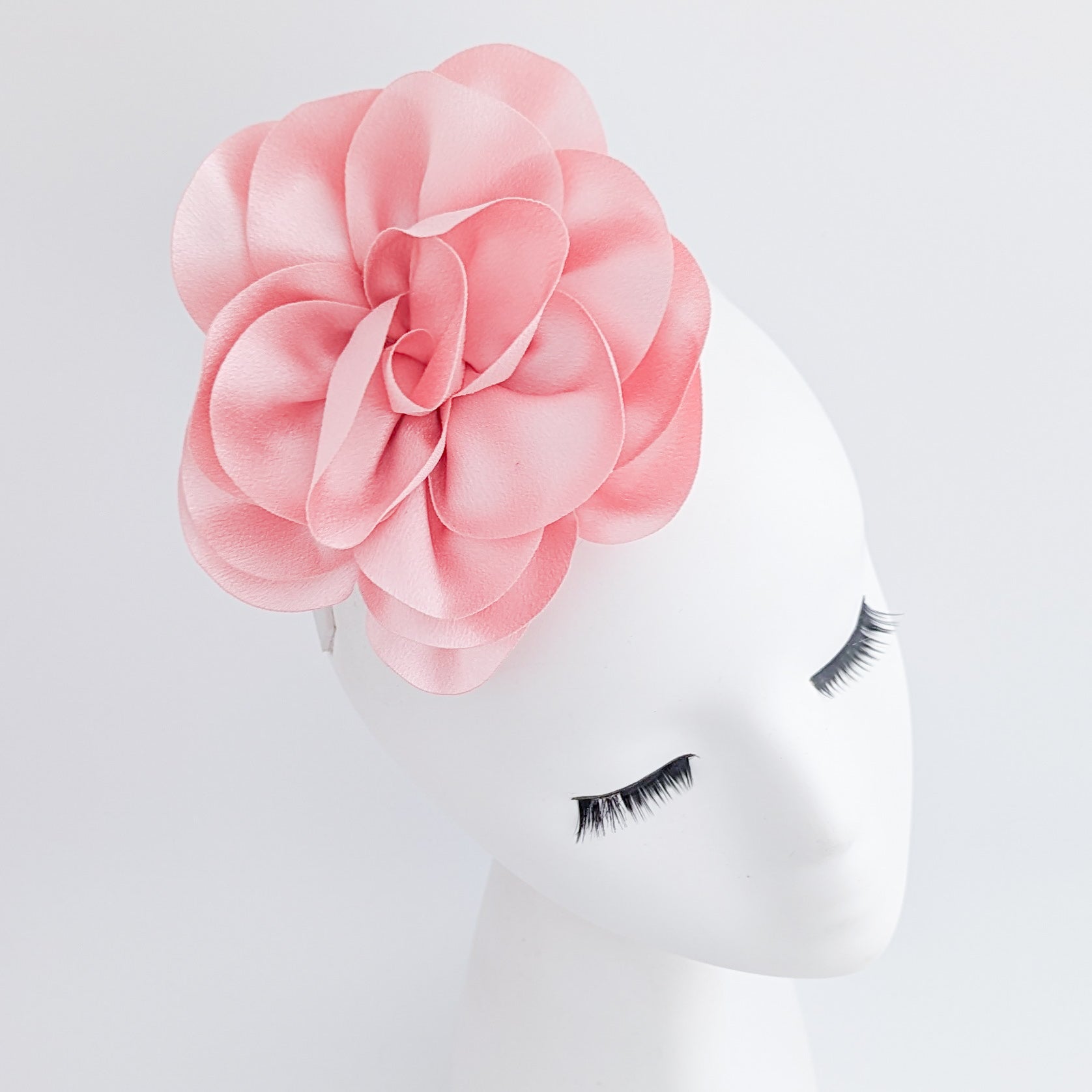 Light pink satin rose fascinator hat