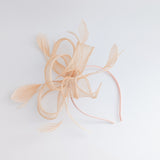 Light peach feather fascinator hat Light peach feather fascinator hat