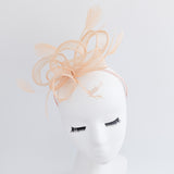 Light peach feather fascinator hat Light peach feather fascinator hat
