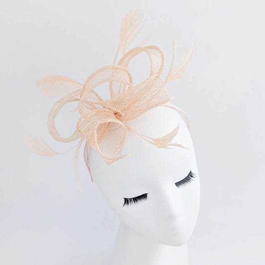 Light peach feather fascinator hat House of Hats