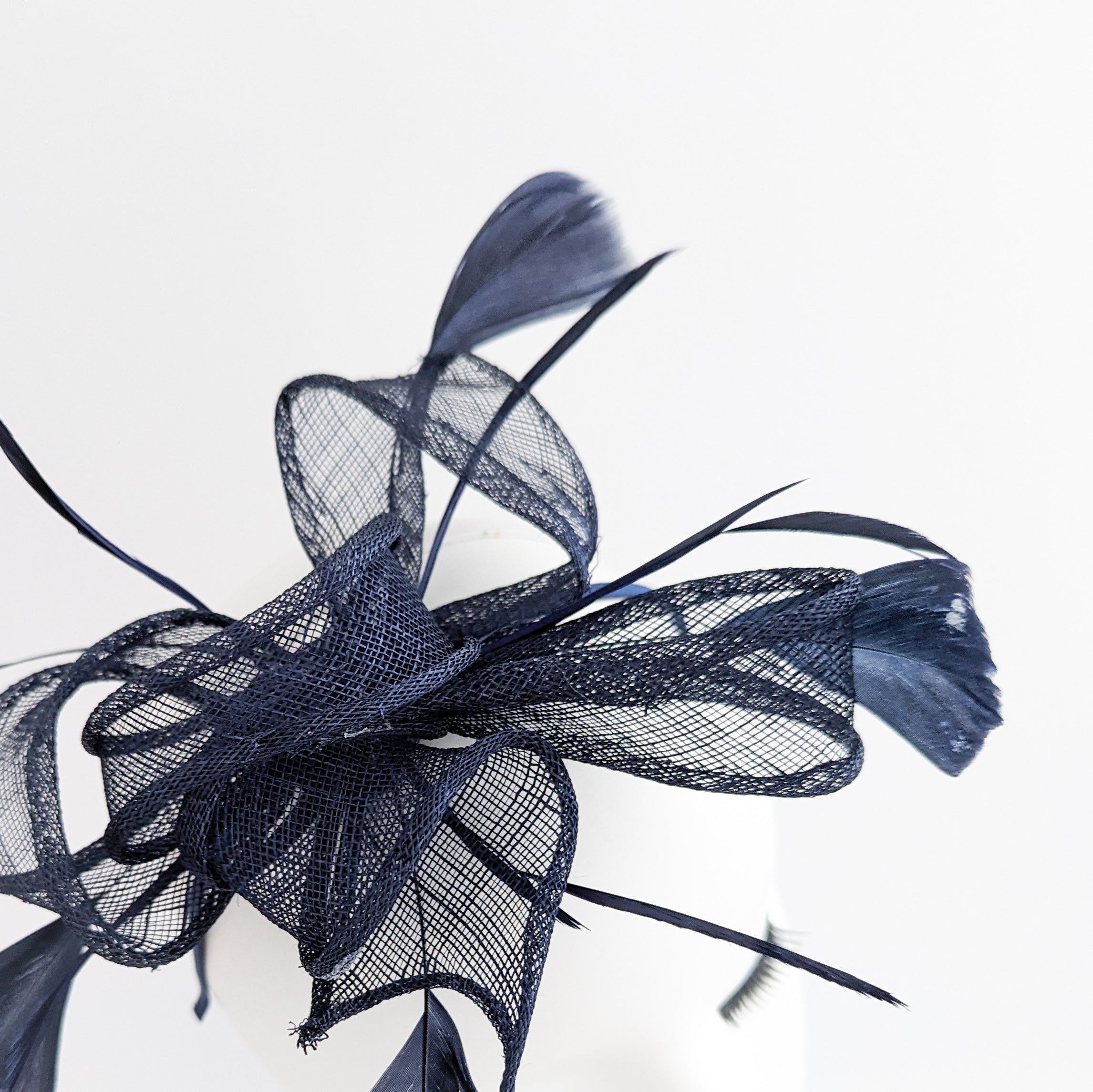 Navy blue feather fascinator hat