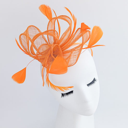Orange feather fascinator hat