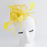 Yellow feather fascinator hat Yellow feather fascinator hat