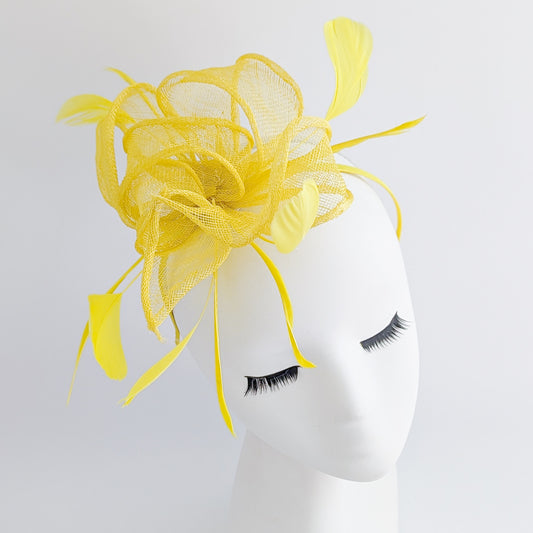 Yellow feather fascinator hat