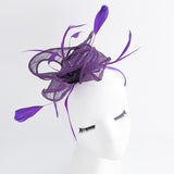 Aubergine cadbury purple feather fascinator hat