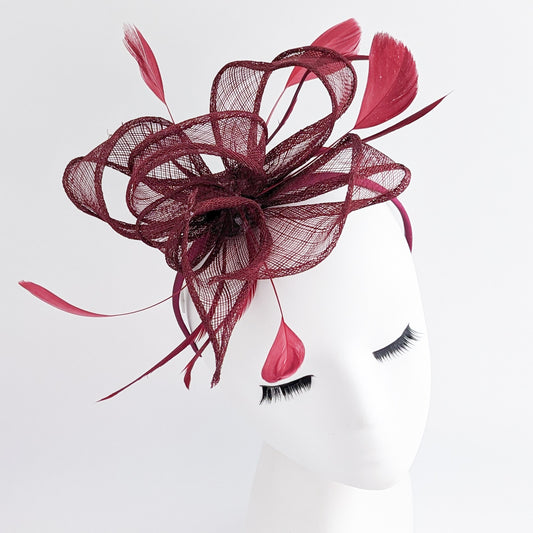 Burgundy feather fascinator hat