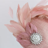 Blush pink feather pearl fascinator hat Blush pink feather pearl fascinator hat