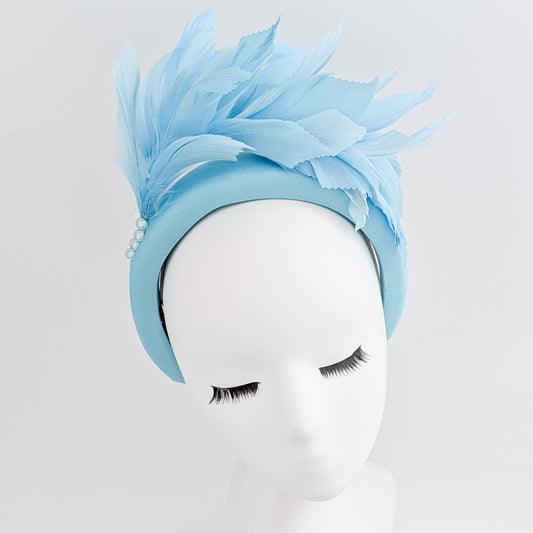 Light sky blue feather padded headband fascinator