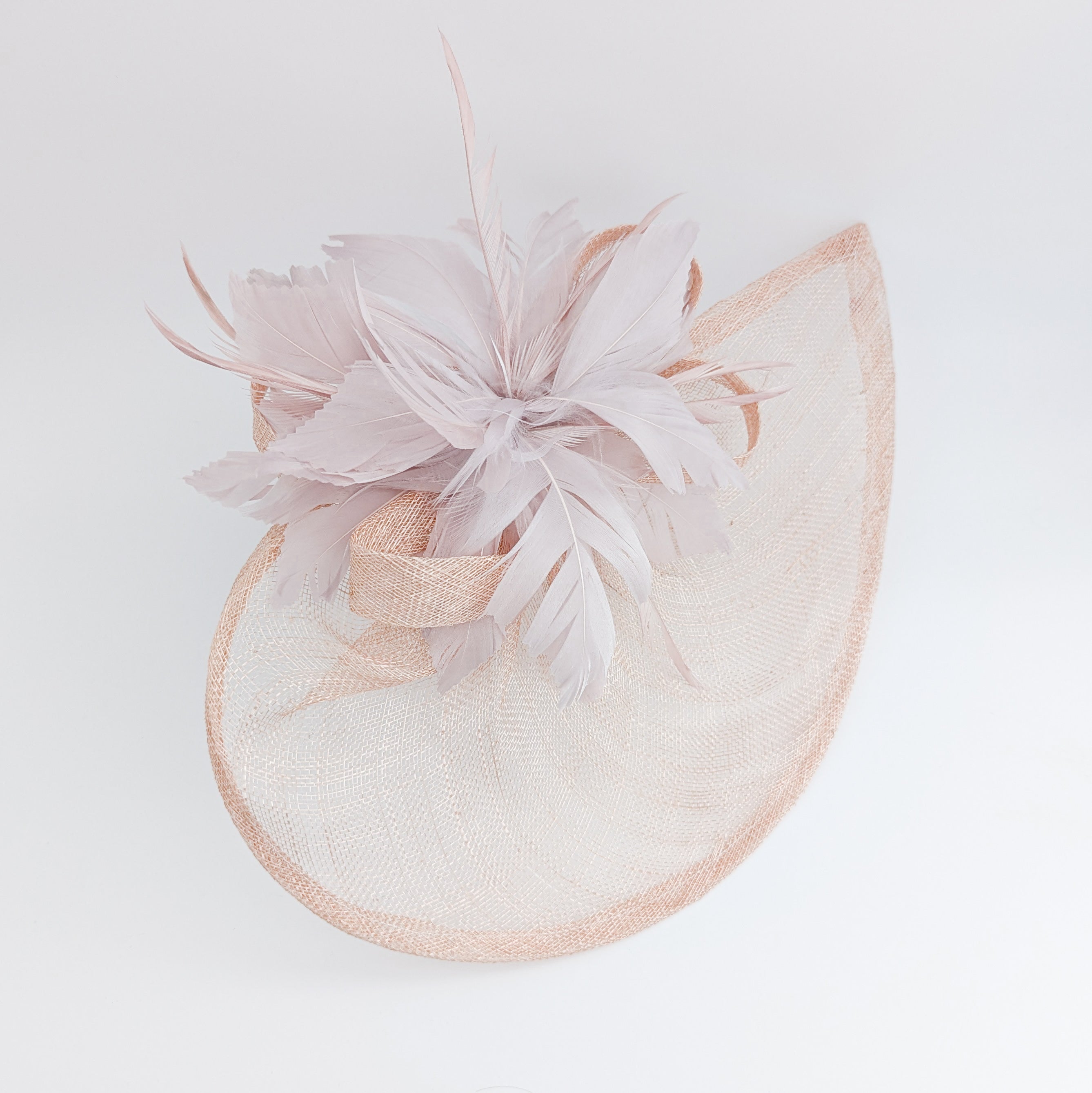Blush pink feather large teardrop fascinator hat Blush pink feather large teardrop fascinator hat