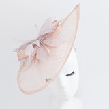 Blush pink feather large teardrop fascinator hat Blush pink feather large teardrop fascinator hat