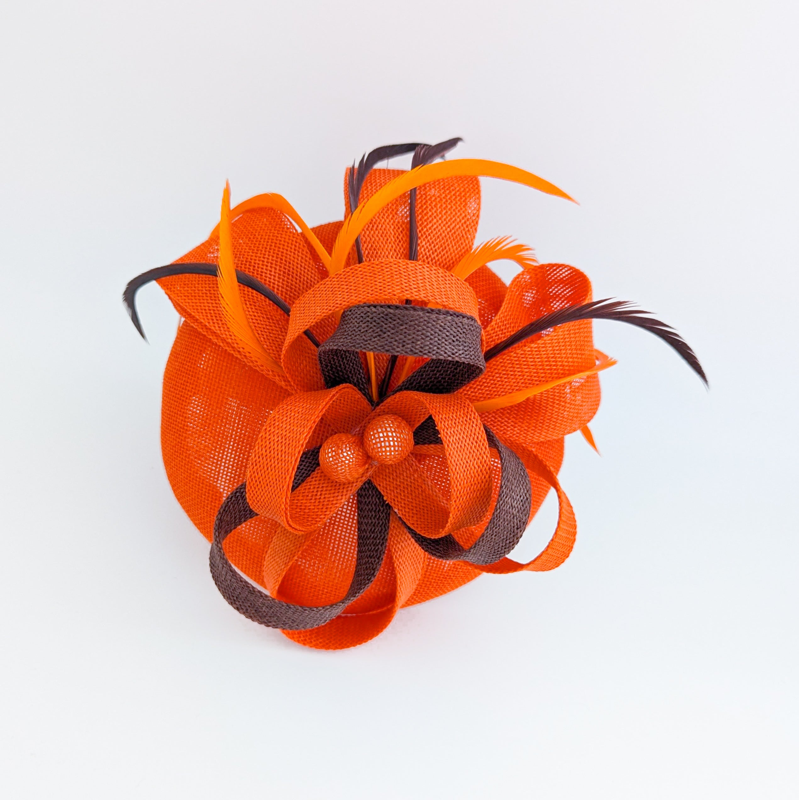Orange brown feather fascinator disc saucer hat Orange brown feather fascinator disc saucer hat