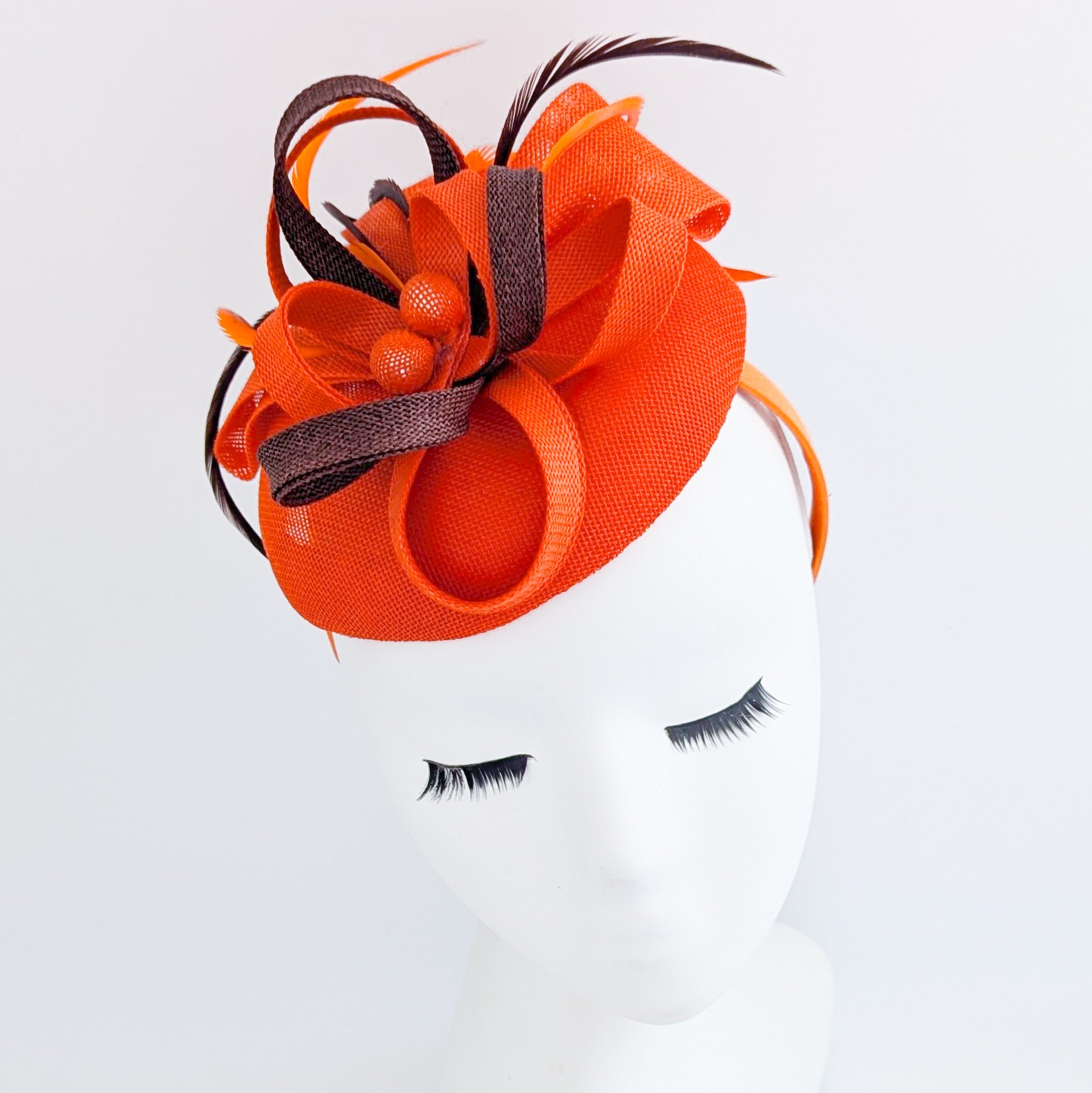 Orange brown feather fascinator disc saucer hat Orange brown feather fascinator disc saucer hat