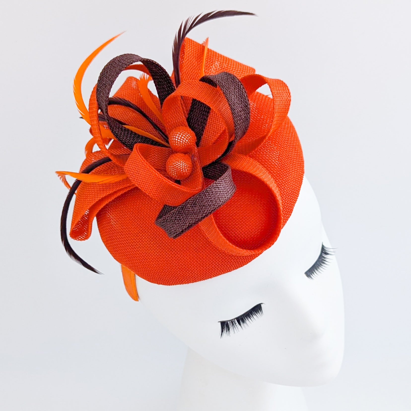 Orange brown feather fascinator disc saucer hat Orange brown feather fascinator disc saucer hat